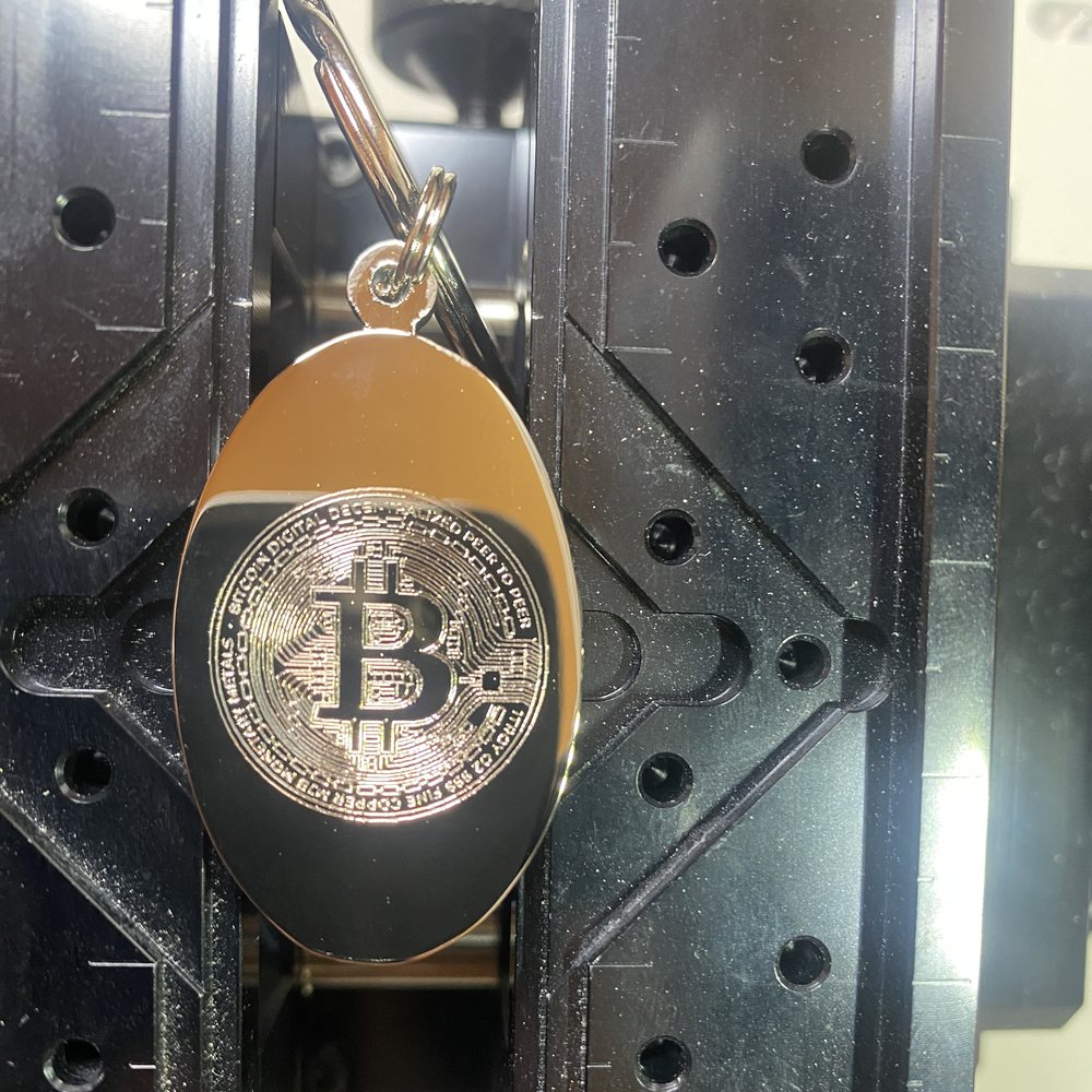 Schlüsselanhänger mit Bitcoin-Motiv